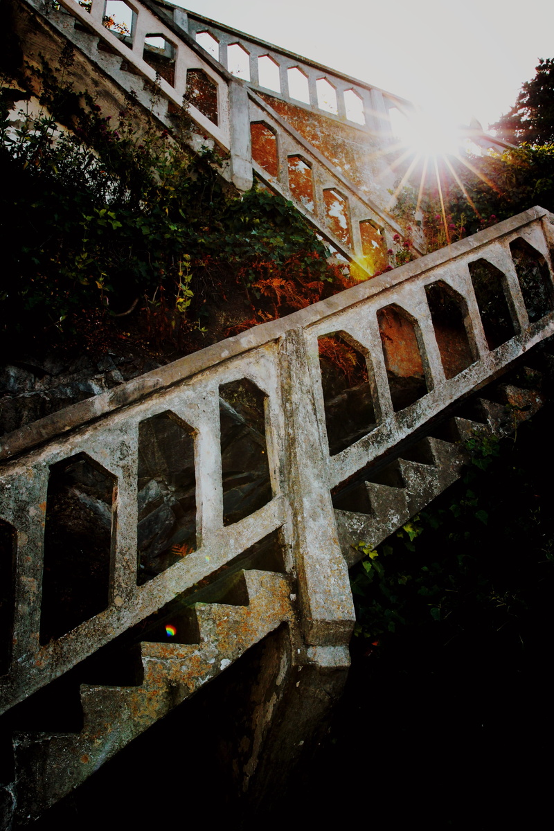 built structure, no people, metal, alcatraz federal penitentiary, railing, low angle view, lens flare, architecture, bridge - man made structure, day, bridge