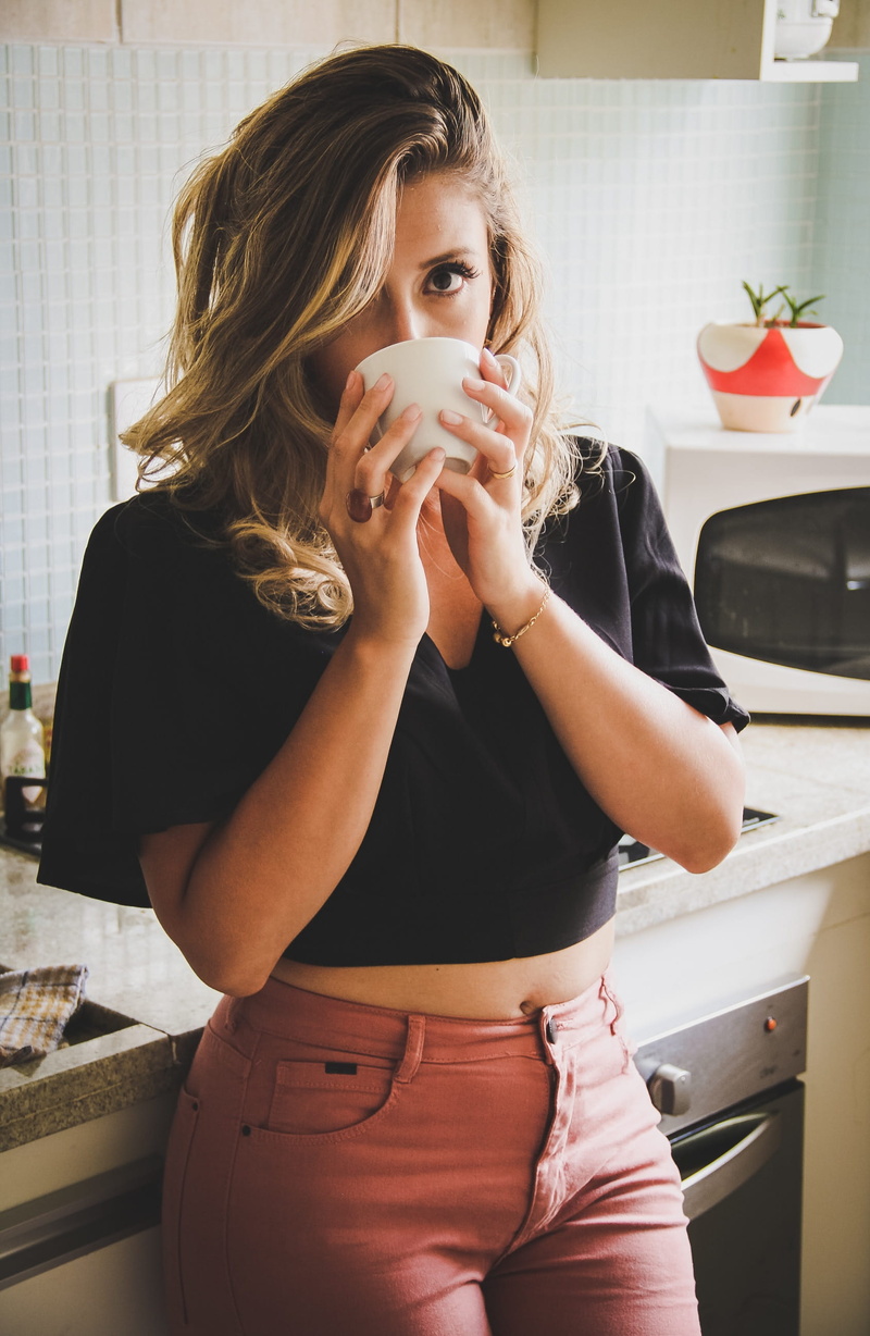 food and drink, home interior, cup, coffee drink, photoshoot, real people, posing, hair, wearing, pose, domestic room, facial expression, one person, fashionable
