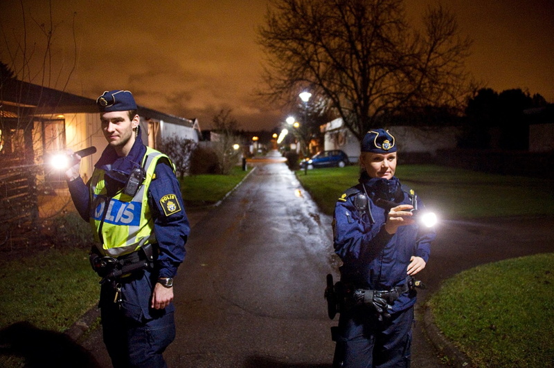 police, two people, clothing, plant, street, portrait, tree, lighting equipment, looking at camera, night, real people, people, standing, women, three quarter length