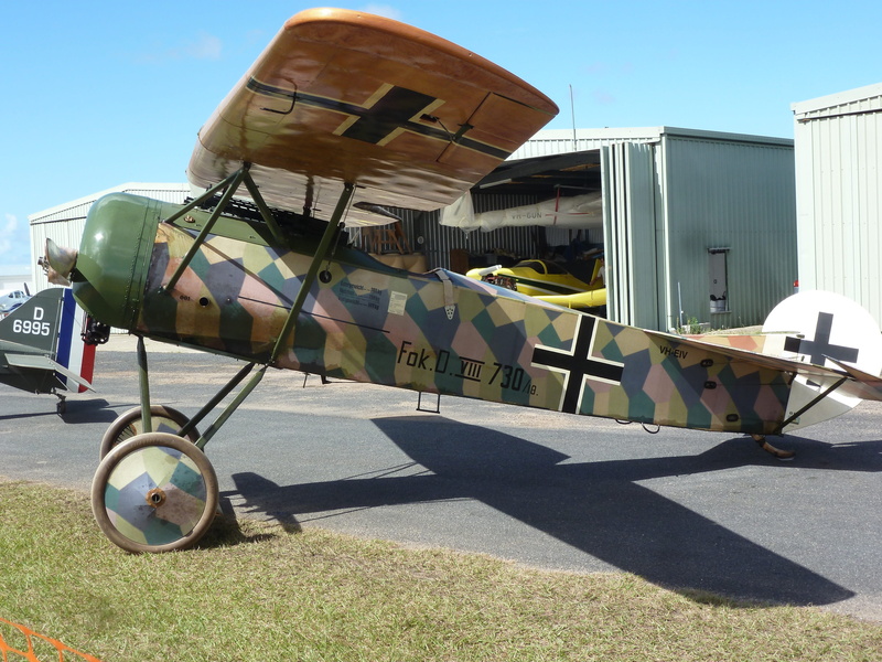 replica, sunlight, shadow, antique, mode of transportation, airplane, architecture, sunny, fokker d-8, road, plane, nature, airport runway, transportation