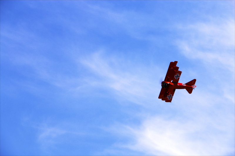 sky, motion, clouds, mode of transportation, manfred, plane, on the move, mid-air, outdoors, red baron, airplane, red, nature, richthofen, religion, flying