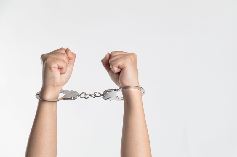 handcuff, handcuffed, arms, body part, wrist, handcuffs, person, white background, silver colored, chain, human joint, trapped, hand, human hand, holding