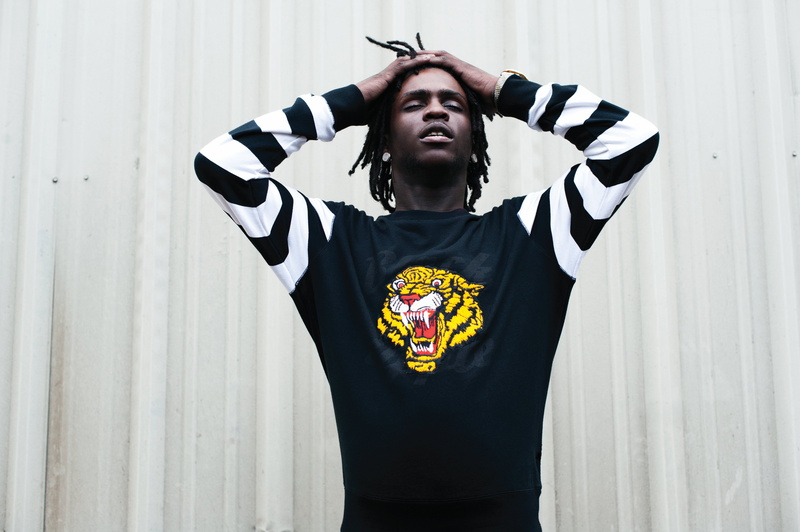 arms raised, caucasian Ethnicity, gucci, african Descent, only Men, human arm, one Person, young Adult, leisure activity, black, outdoors, wall - building feature