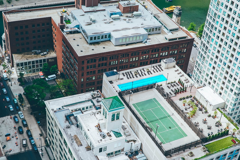 drone view, built Structure, tennis court, urban Scene, court, incidental people, building, aerial View, high Angle View, architecture, photo, along, building Exterior