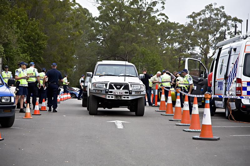 group of people, road block, lifestyles, surrounding, nissan, plant, car, discovery, tree, traffic, road, patrol, motor vehicle, uniform, land vehicle