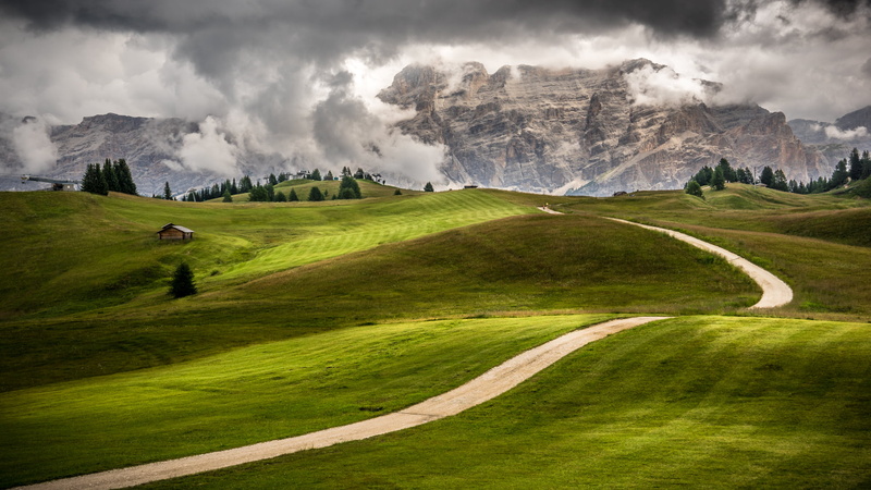 tranquil scene, mountain, house, grass, plant, mountain range, cloud - sky, tranquility, Trentino, environment, beauty in nature, landscape, trees, snowcapped mountain