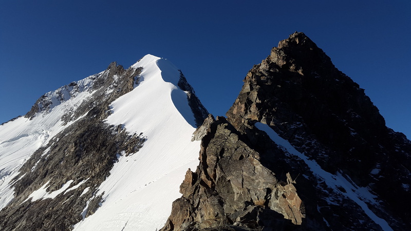 clear sky, summit, outdoors, scenics - nature, ridge, piz bernina, winter, snow, cold temperature, activity, alpine, sport, mountains, mountain range, switzerland