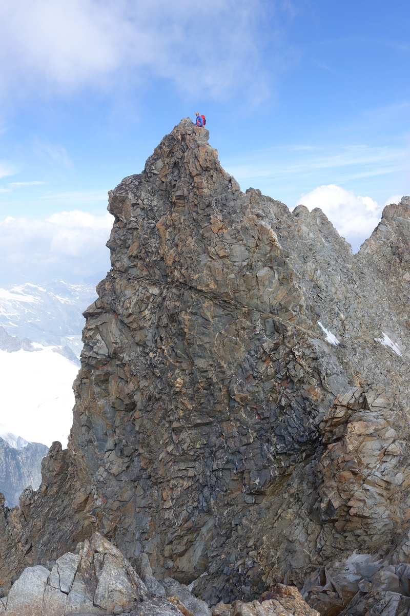 climber, day, non-urban scene, rock, mountain peak, mountaineering, geology, graubünden, sky, cloud - sky, beauty in nature, formation, abyss, engadin