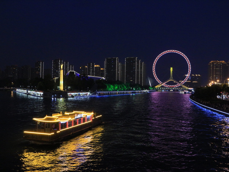 illuminated, night, water, city at night, waterfront, ferris, lit boat, cityscape, architecture, lights, waterway, wheel, modern, office building exterior