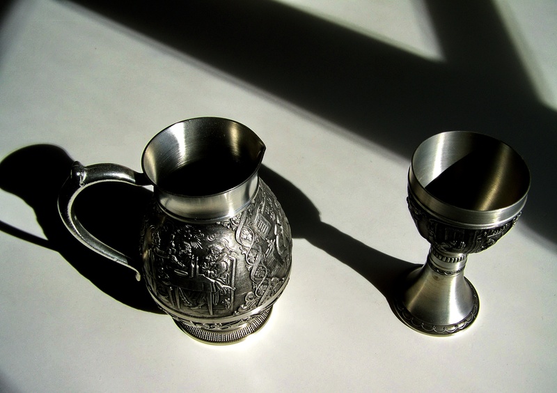 still life, shiny, focus on foreground, indoors, light shadow, cup, alloy, high angle view, food and drink, steel, kitchen utensil, salt shaker, two objects