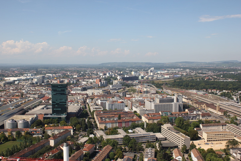 water, sea, outdoors, crowd, basel, horizon, views, architecture, cloud - sky, settlement, crowded, cityscape, sky, built structure, aerial view, residential district