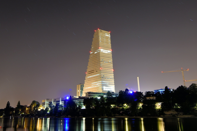 tall - high, travel destinations, financial district, skyscraper, basel, building, illuminated, buildings, modern, water, sky, city, building exterior