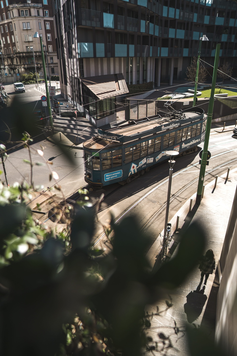 transportation, 5K, porta garibaldi, buildings, way, town, building exterior, near, shadow, no people, selective focus, sunlight, building, tram, train