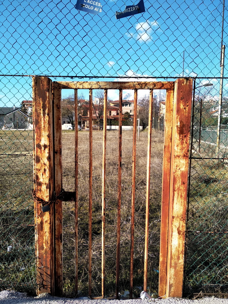 plant, light, rusty, metal, sunlight, porta, deterioration, door, safety, torii, day, flare, lock, grille, no people, avezzano, prison, old, gate, field