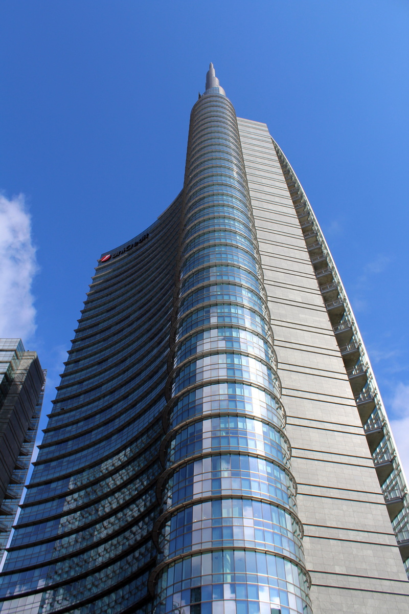 glasses, office building exterior, blue, city, sky, tower, financial district, italy, built structure, lombardy, building, low angle view, porta garibaldi