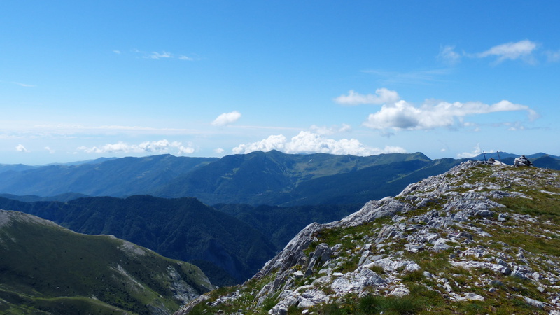 non-urban scene, mountain range, environment, blue, mountain, no people, tranquility, tranquil scene, landscape, cloud - sky, mountain ridge, day, view