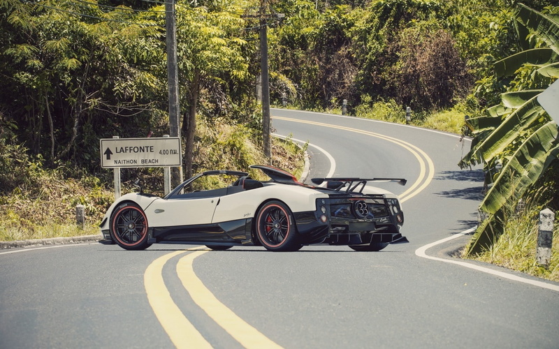 city, Pagani Zonda Cinque Roadster, text, communication, sunlight, land vehicle, no people, 720P, road, road trip, sign, wheel, motor vehicle, transportation