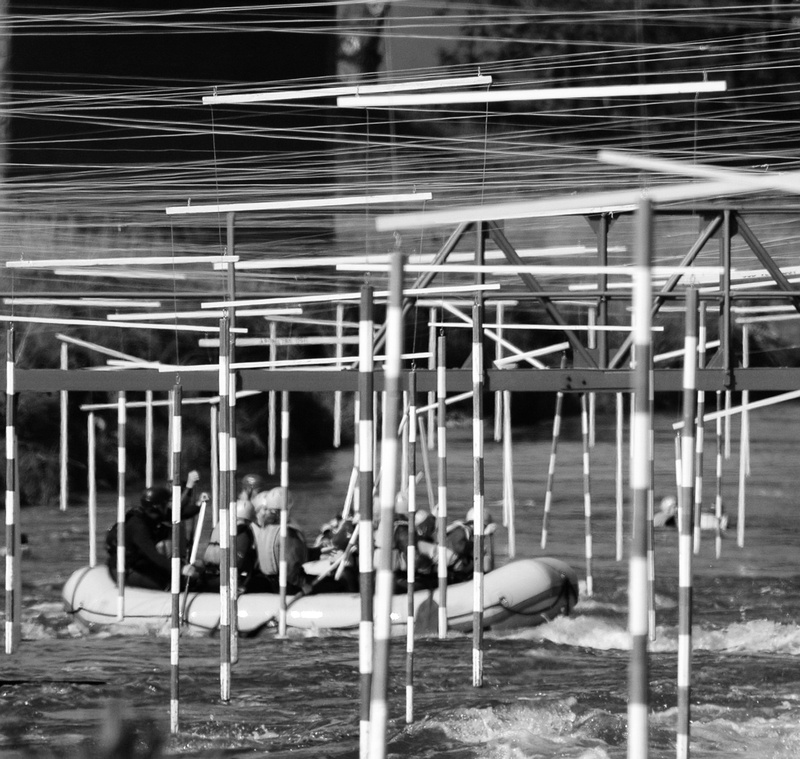 leisure activity, motion, illuminated, industry, wickets, day, blurred motion, lifestyles, slalom, men, building, metal, seat, raft, real people, rod, building exterior
