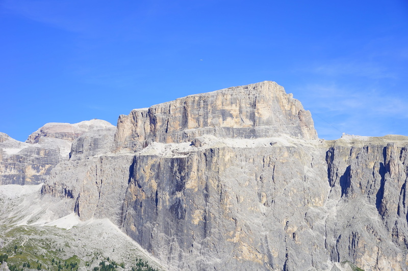 italy, outdoors, environment, sella massif, non-urban scene, sky, tranquil scene, rock - object, low angle view, blue, dolomites, mountain landscape, beauty in nature