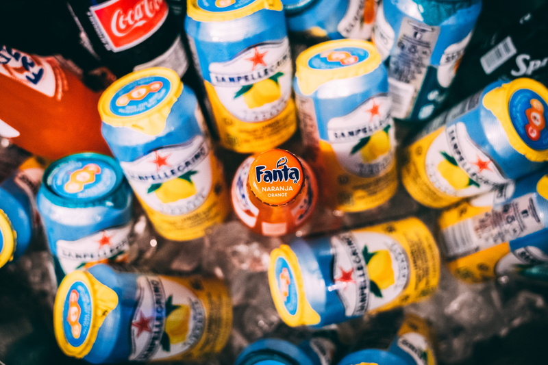 cold, selective focus, ze, choice, food and drink, label, group of objects, large group of objects, bottles, no people, retail, assorted, soft drink, vibrant