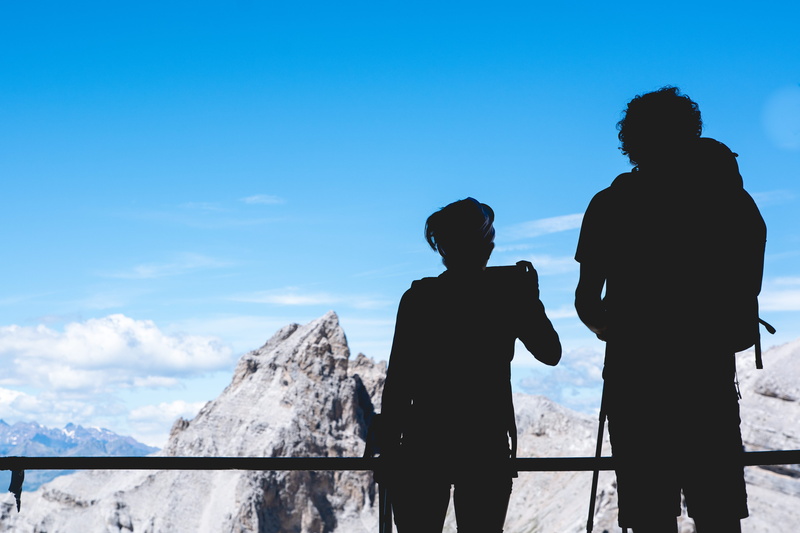 blue, bonding, two people, hiking, ice, mountain top, people, clear, three quarter length, italy, rear view, dolomits, leisure activity, rail, beauty in nature