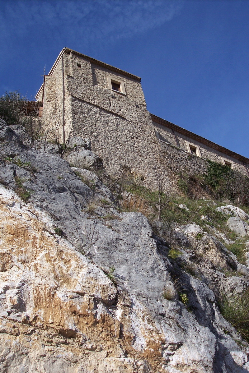 blue, mountain, history, outdoors, clear sky, old, nature, low angle view, architecture, Rocca, no people, sunlight, built structure, stone material, the past