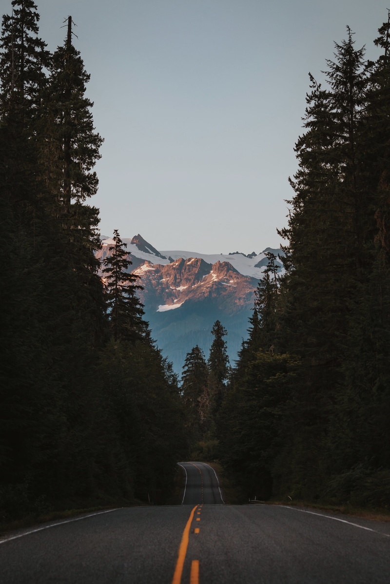 transportation, mountains, wander, explore, ridge, no people, sign, nature, snow, mode of transportation, car, asphalt, land vehicle, mountain road, road trip