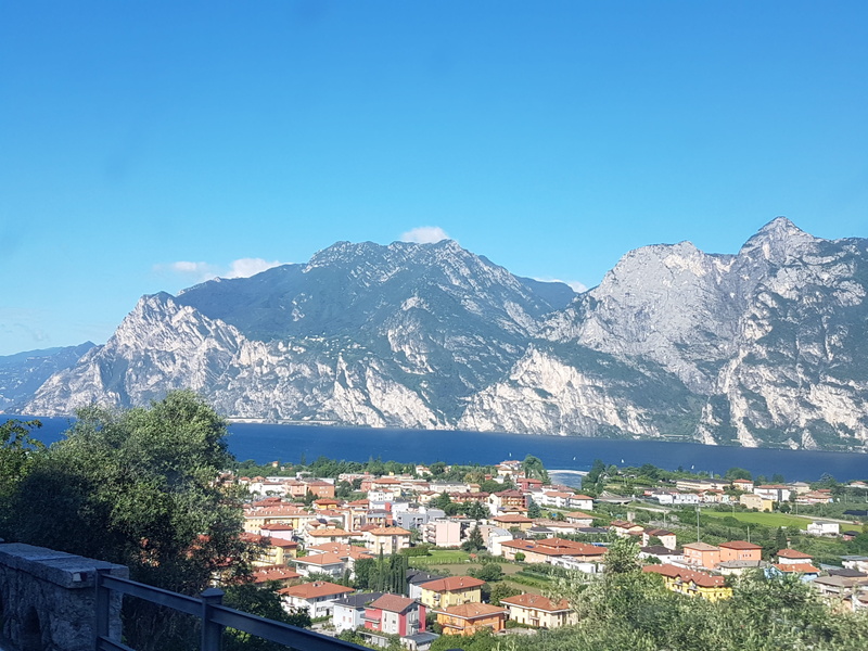 italy, building exterior, beauty in nature, lake, snowcapped mountain, clear sky, sky, garda, day, 4K, nature, outdoors, city, mountain range, scenics - nature