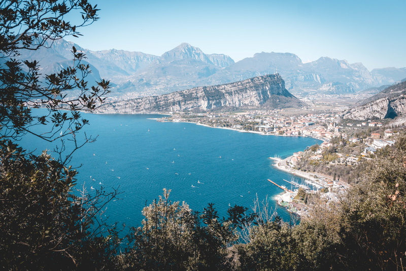 high angle view, sky, ocean, architecture, no people, coast, mountain, shoreline, tree, scenics - nature, italien, promontory, tranquility, landscape, lake garda