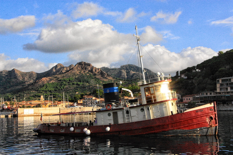 sailboat, architecture, built structure, transportation, day, port, outdoors, mode of transportation, ship, elba, passenger craft, cloud - sky, water, city