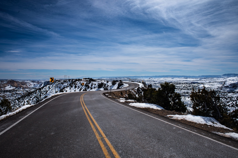building, asphalt, cliffs, two lanes, road marking, the way forward, empty road, sign, outdoors, zebra crossing, housing, utah, way, escalante, promontory