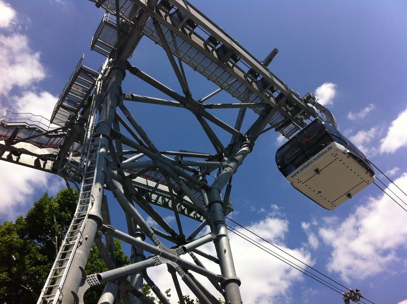 built structure, tall - high, no people, sky, amusement park ride, koblenz, arts culture and entertainment, architecture, cableway, germany, pole, cloud - sky