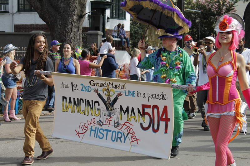 city, walking, leisure activity, day, sign, float, new orleans, protest, real people, large group of people, lifestyles, group, mardi gras, young adult