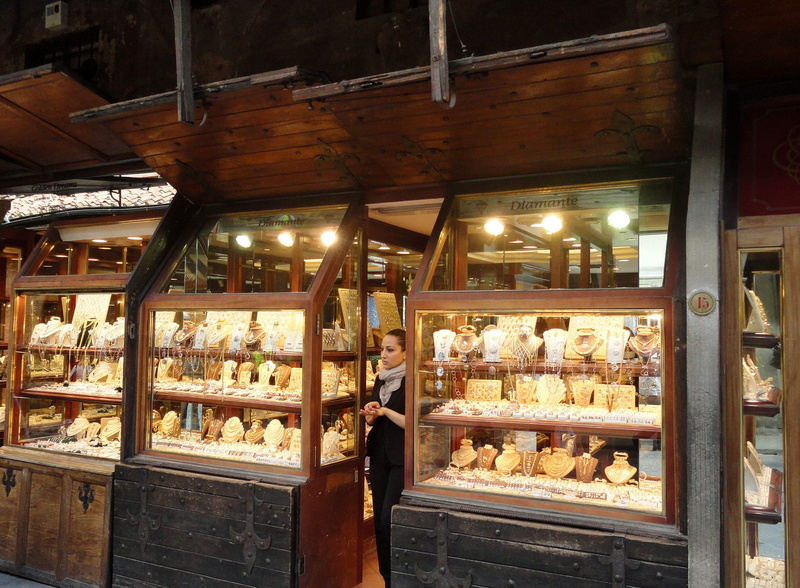 abundance, store, standing, adult, woman, food and drink, jewellery, beside, business, choice, large group of objects, illuminated, florence, one person