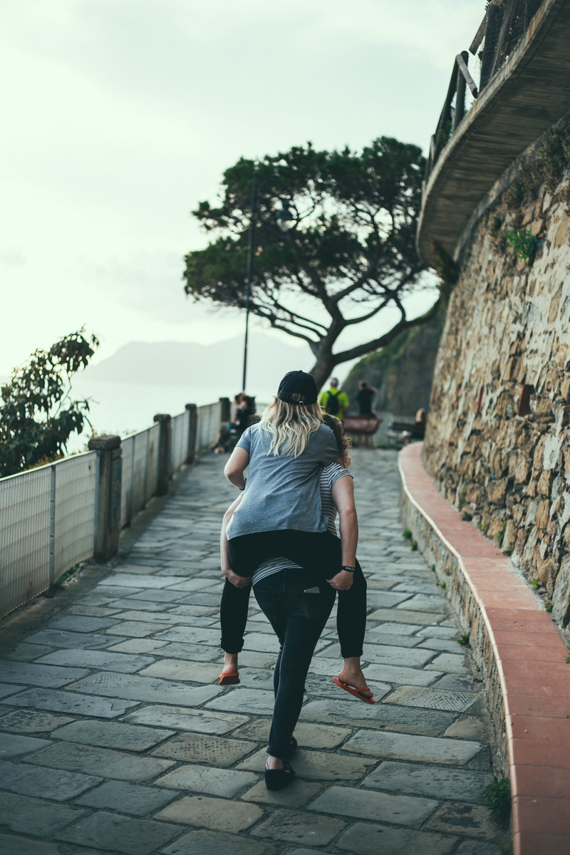 full length, nature, riomaggiore, architecture, paving stone, tree, day, coast, mountains, love, piggyback, plant, built structure, walking, direction