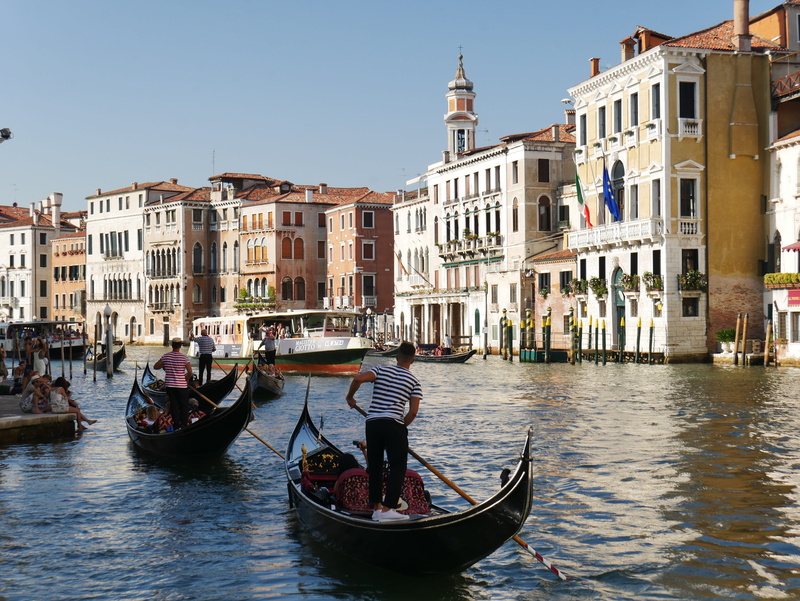 real people, clear sky, gondolier, water, mode of transportation, architecture, outdoors, venice, gondola, nautical vessel, canal, citytrip, transportation