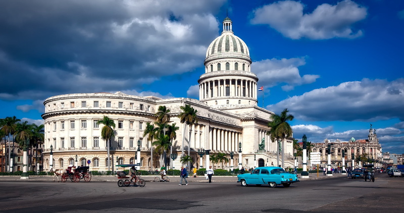 church, landmark, cityscape, nature, travel destinations, car, clouds, government, antique, cuba, sky, urban Scene, day, palm trees, neo-classical, disrepair