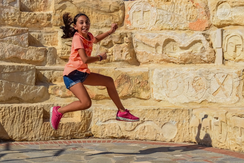 woman, happy, side view, female, amphitheater, wall - building feature, real people, lifestyles, 5K, motion, model, day, architecture, teenager, girl