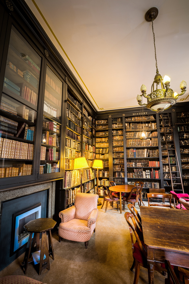 pritty, chair, historic, table, learning, business, shelves, learn, bookshelves, inside, reading, seat, retail, publication, large group of objects, bookshelf