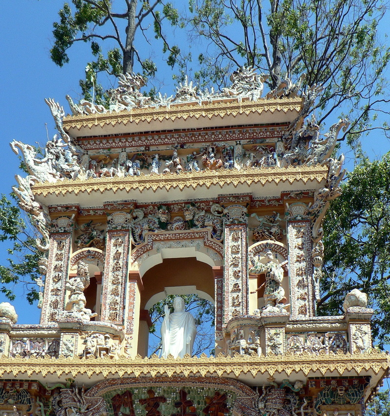ornate, day, architectural column, religion, travel destinations, building, portico, art and craft, spirituality, history, caodai, tree, sky, the past