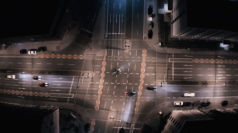 traffic light, motor vehicle, droneshot, town, communication, built structure, cross, directly above, no people, cars, view, transportation, stage, traffic