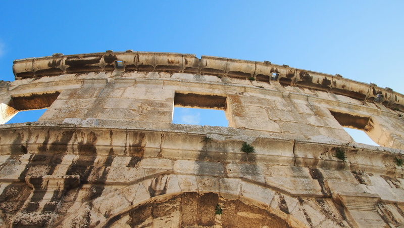 places of interest, ancient, architecture, low angle view, holiday, amphitheater, blue, summer, city, no people, travel, pula, croatia, archaeology, old ruin