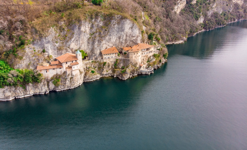 religion, drone, no people, rock, christianity, leggiuno, day, beauty in nature, catholic church, lake, catholic, church, lombardy, nature, land, mountain