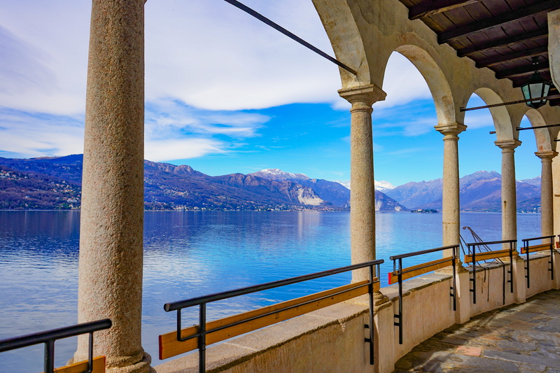 tranquil scene, faith, lake, built structure, tranquility, nature, santa caterina del sasso, hermitage, sea, historian, italy, mountain, transportation