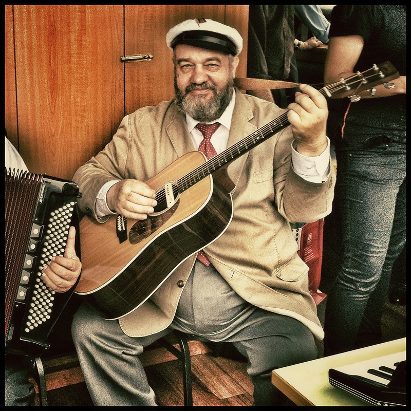 adult, sailor, chair, real people, painting, sitting, indoors, hamburg, three quarter length, acoustic guitar, playing, plucking an instrument, 1080P