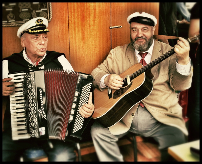 adult, artist, holding, males, musical instrument, port, arts culture and entertainment, men, shanty, music, two people, indoors, 1080P, northern germany