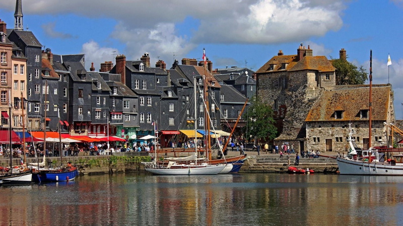 travel destinations, normandy, water, europe, incidental people, house, canal, built structure, cloud - sky, boat, residential district, honfleur, nautical vessel
