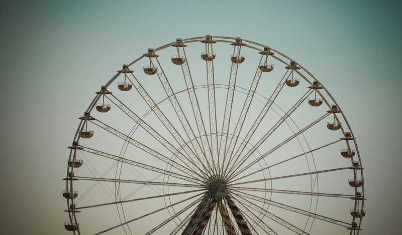 arts culture and entertainment, semi-circle, ferris wheel, circle, outdoors, roundabout, nature, spoke, honfleur, carousel, spinning, amusement park, shape