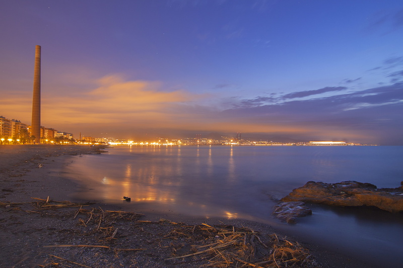 orange color, auga, beauty in nature, sky, quinoal, playa de la misericordia, málaga, dusk, water, spain, playa, architecture, chimenea del plomo, illuminated