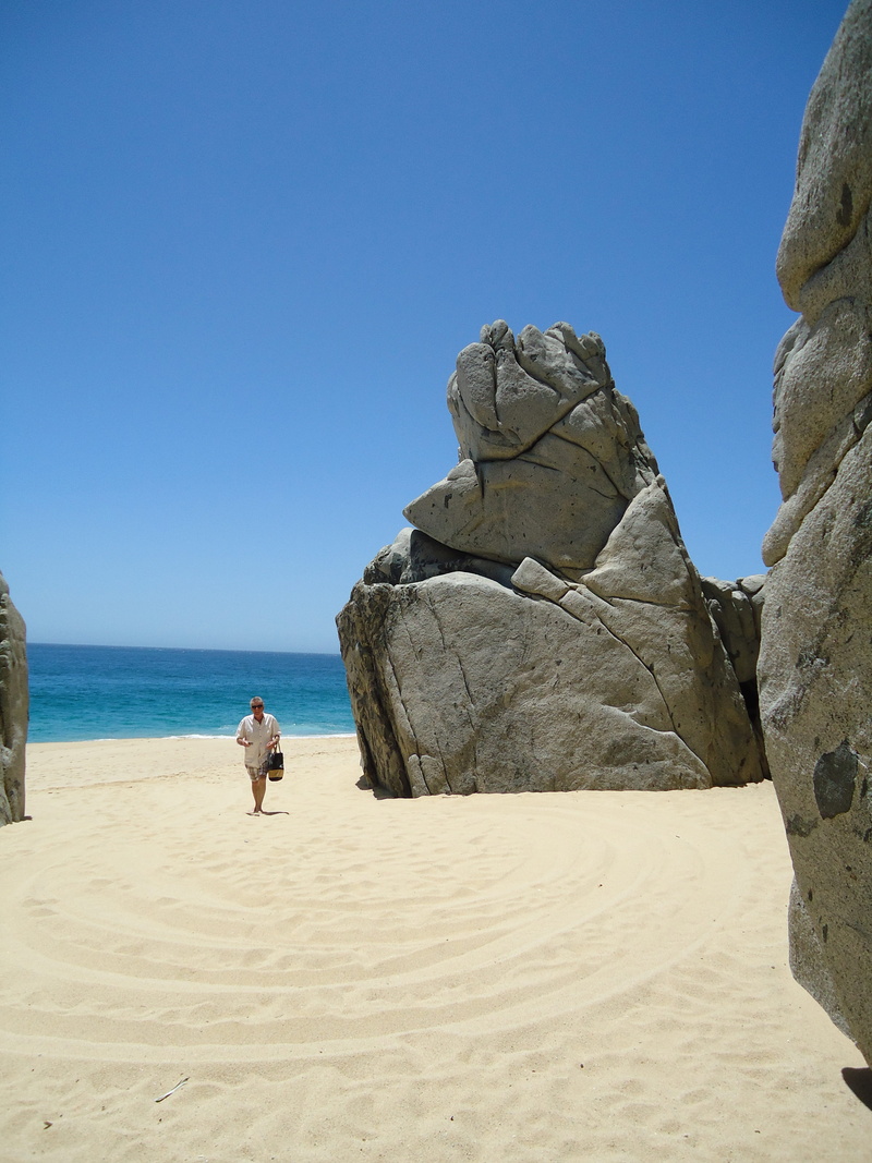 royalty, scenics - nature, solid, coast, outdoors, water, beach, real people, ocean sky, tranquility, 4K, landmark, rock - object, clouds, land, horizon over water